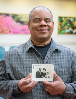 man holding a photo